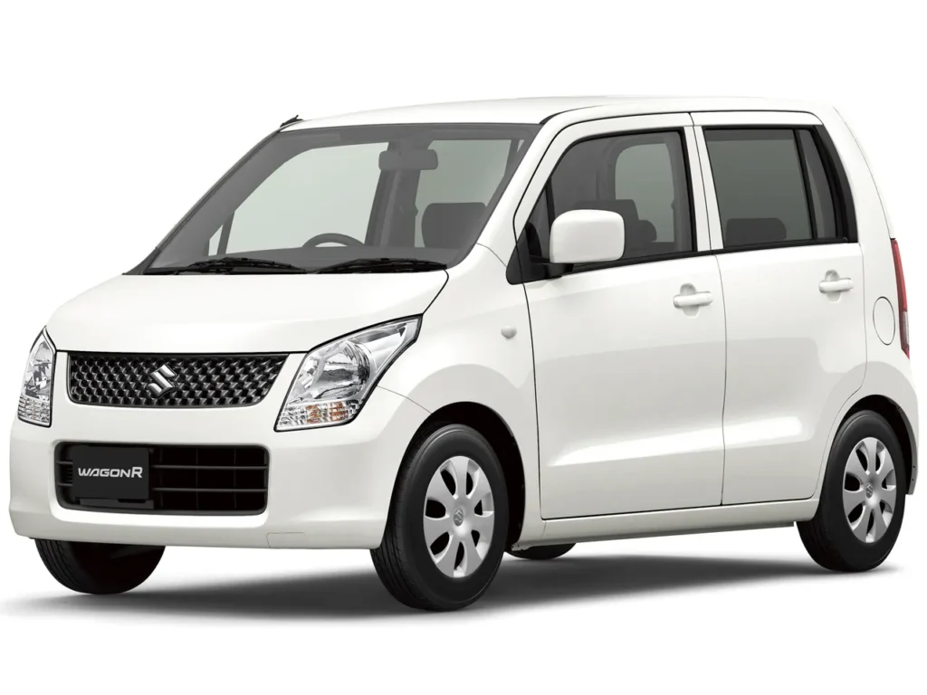 Front three-quarter view of a white Suzuki Wagon R hatchback shown from the left front side.